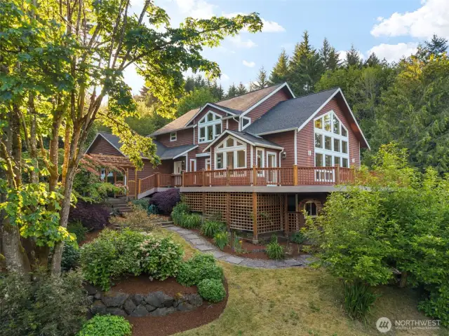 Welcome to the quintessential Pacific NW home, sited on a generous 2.3 acre lot.