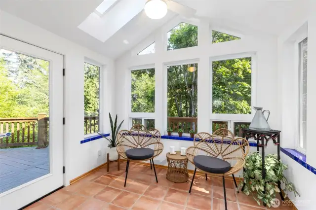 Sip your morning coffee in the cheery sunroom, nestled next to the spacious dining room.