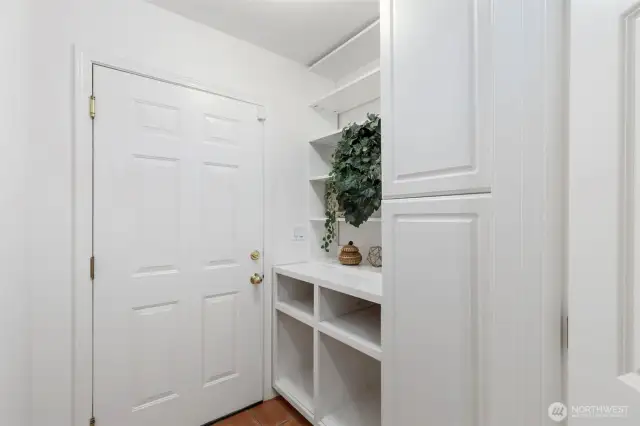 Mudroom adjacent to garage.