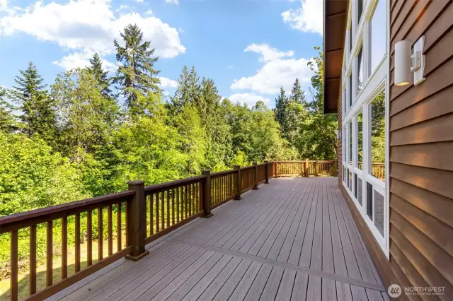 Enjoy peek a boo views of sparkling Liberty Bay from the oversize deck.