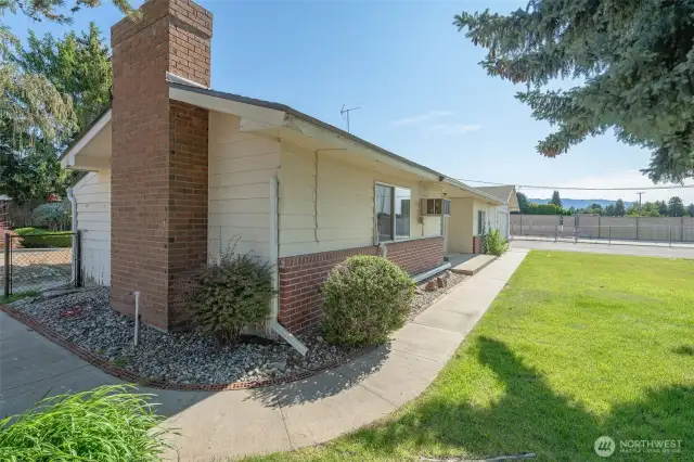 Side yard. Entire lot has low-maintenance landscape and is fully irrigated.