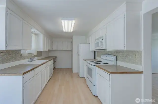 Kitchen has potential to be opened up and expanded