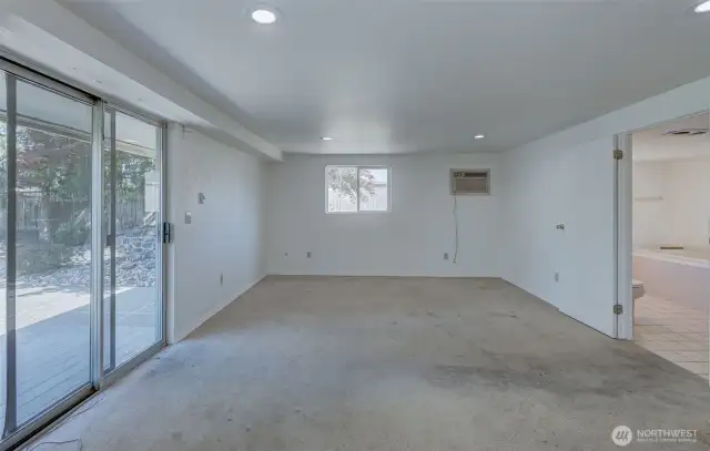 Primary suite is large, bright and has its own access to the back yard!