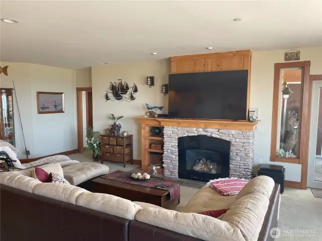 Cozy propane fireplace in the spacious living room