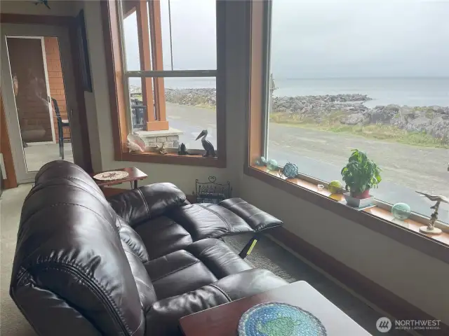 Watch the surfers, pelicans and whales from your front row recliners