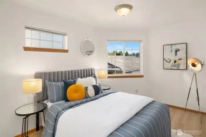 Bright and cozy guest bedroom.