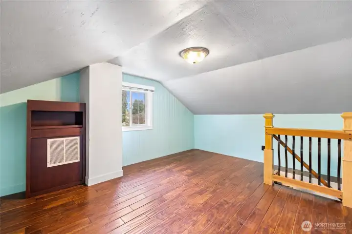 Upstairs includes two more bedrooms.