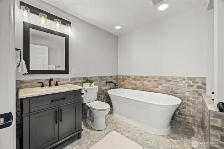 Bathroom off the family room. Remodeled in 2023.