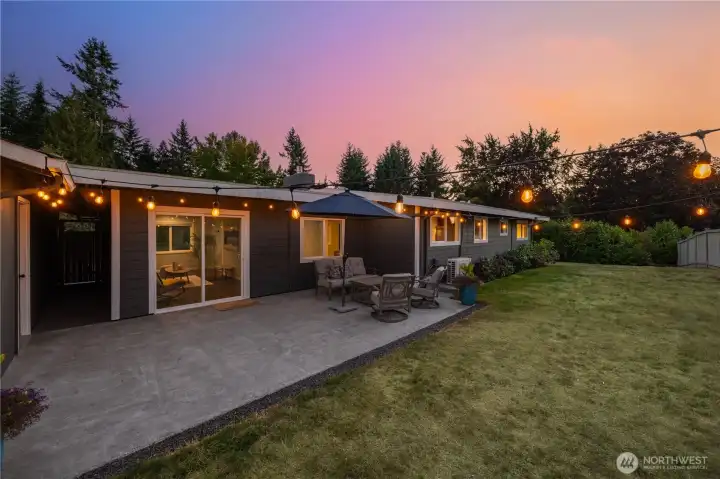 large, fully fenced back yard with multiple gates added in 2021.