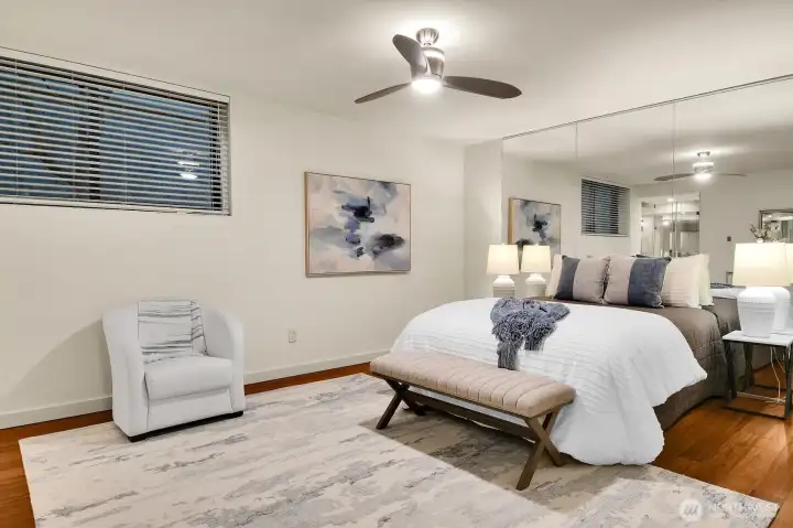 Inviting Primary Bedroom with Luxurious Bath & Grand Walk-In Closet