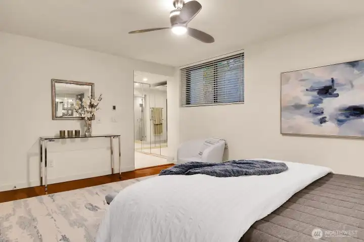 Inviting Primary Bedroom with Luxurious Bath & Grand Walk-In Closet