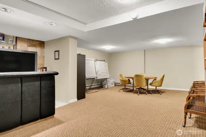 Meeting Room Beneath Our Condominium with Sauna & 3/4 Bath