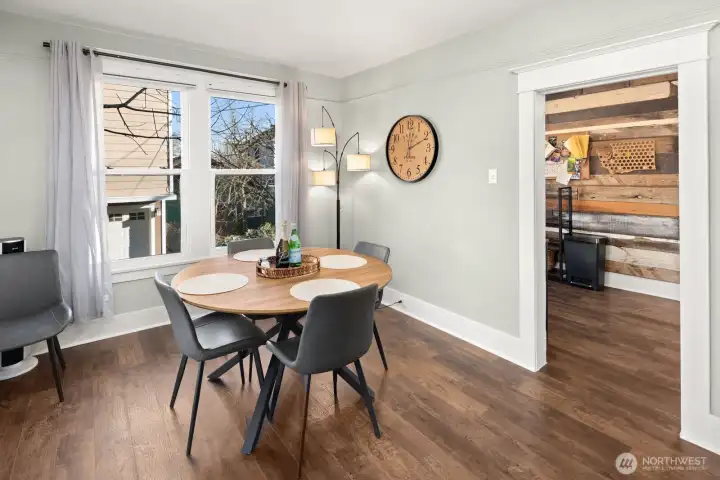 Unit #2015: The dining spacious dining room accommodates a much larger table for entertaining, and is just a few feet from plenty of prep space in the kitchen beyond.