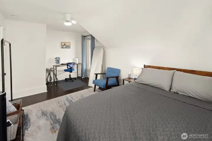 Unit #2015: Upstairs the largest of the three bedrooms is located at the front corner of the house, with both north and east-facing windows - complete with black-out blinds for added comfort.