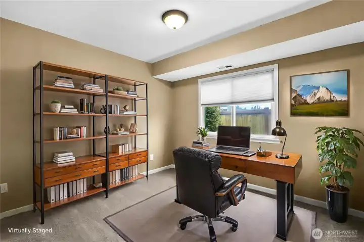 Downstairs 4th bedroom could also be used as a home office. Virtually staged.