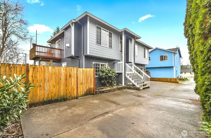 Additional side parking or room for basketball hoop and play.