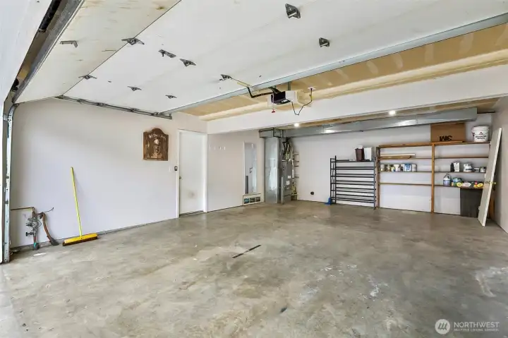 2 car garage with built in shelving. Newer furnace and air conditioner and gas water heater.