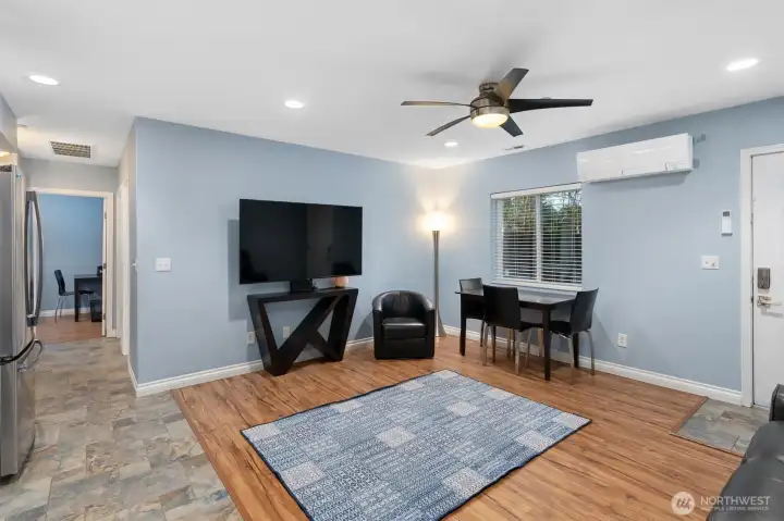 Open living/kitchen, dining room.