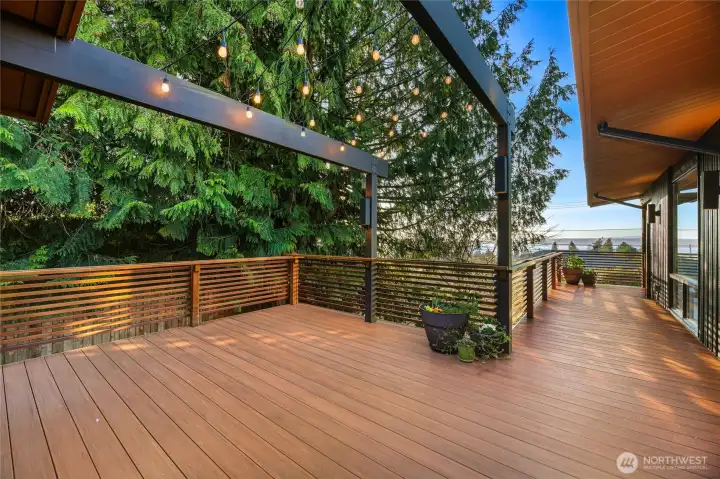 String lights overhead, cedar all around...perfect for al fresco dinners and long summer nights.