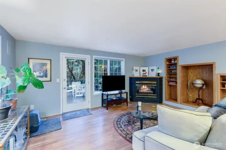 Living room with Fireplace and back deck door