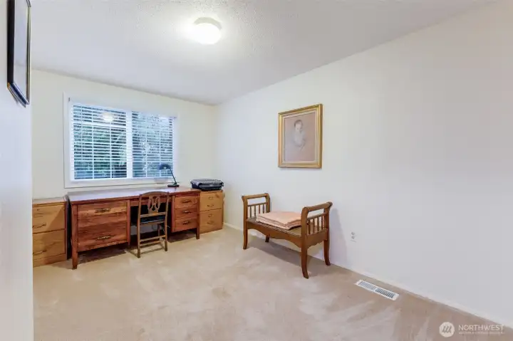 2nd Bedroom Left staircase and on right.