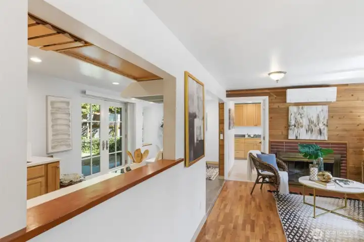Living room, dining and kitchen are seamlessly connected and open to outdoor spaces for easy-flow entertaining.