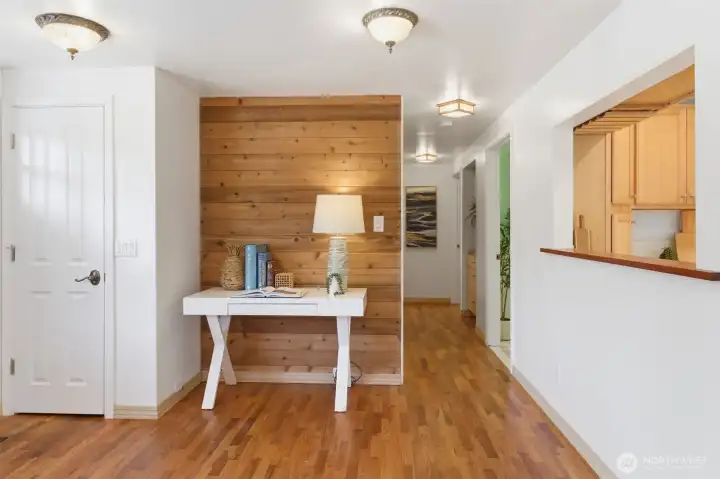Swanky built-ins in the hallway have dedicated lighting.