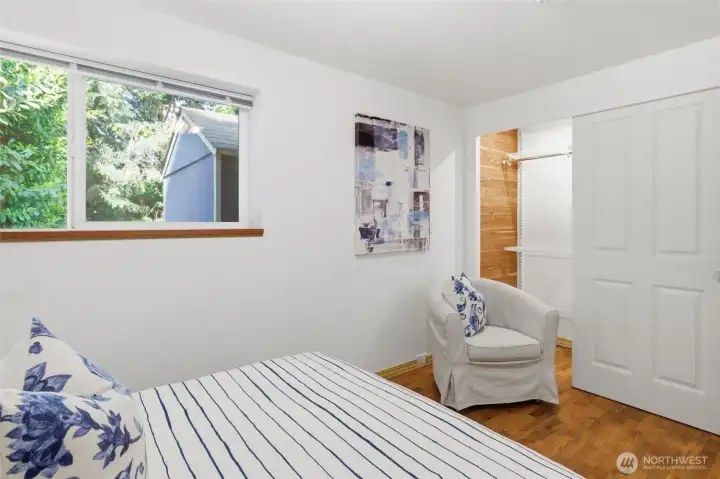 Secondary bedroom also has lighted cedar-lined closet with storage system.