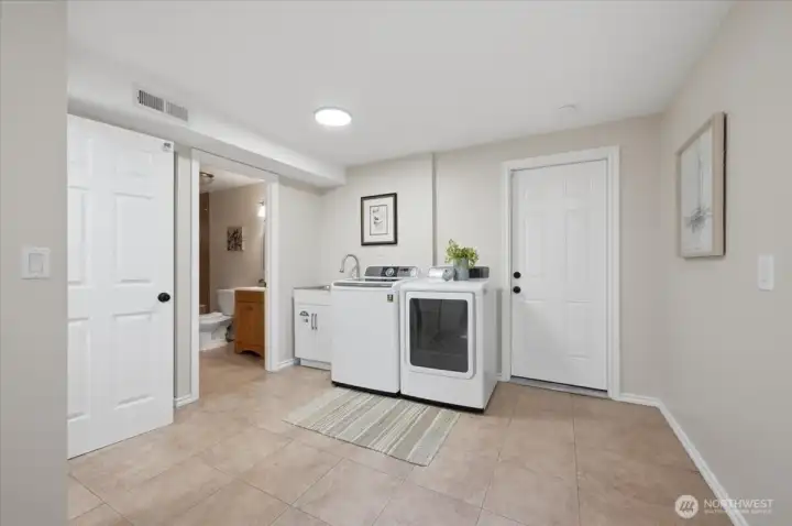 HUGE lower level laundry/mud room