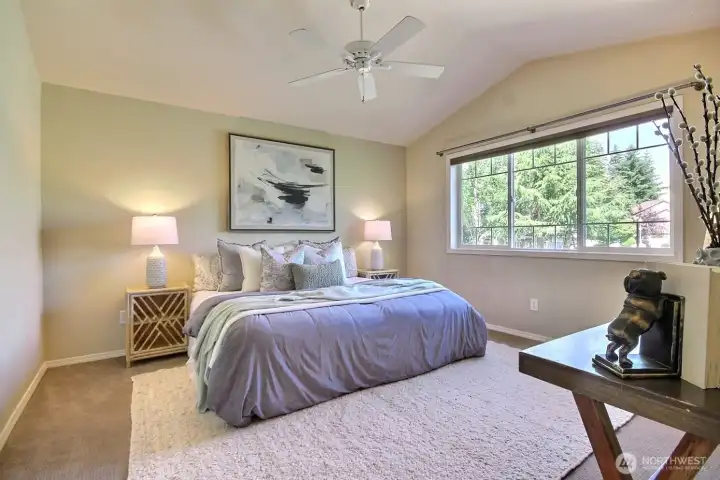 Retreat to a spacious primary bedroom sanctuary complete vaulted-ceilings, a private bath and oversized walk-in closet. Retreat to a spacious primary bedroom sanctuary complete vaulted-ceilings, a private bath and oversized walk-in closet.