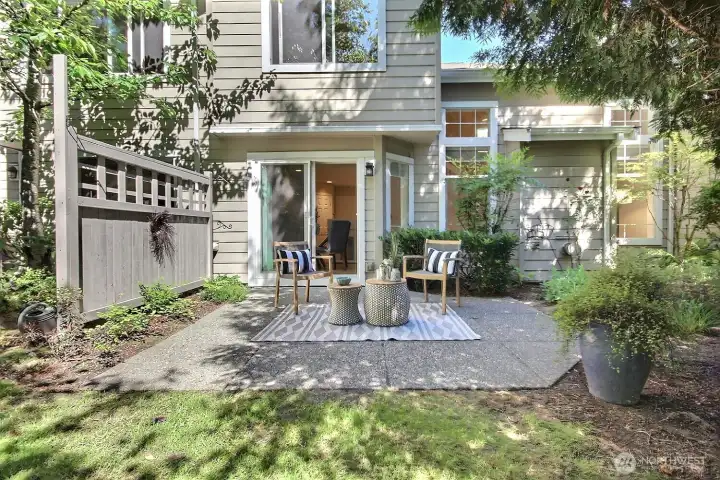 Step outside to an inviting patio ideal for morning coffee, evening wind-downs, or casual entertaining Step outside to an inviting patio ideal for morning coffee, evening wind-downs, or casual entertaining