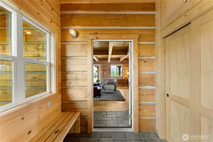 Spacious Methow mudroom with built-in bench & abundant storage.