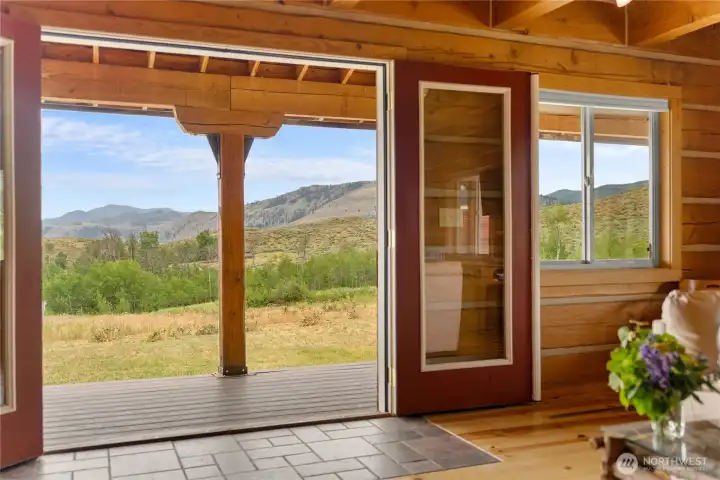 Dining area opens directly to the covered porch for year-round outdoor living.
