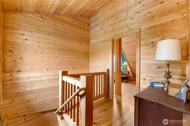 Upper hallway leading to the guest bedroom.