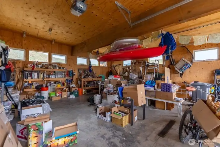 Oversized 936 SF garage/shop with exceptional storage & workshop space.