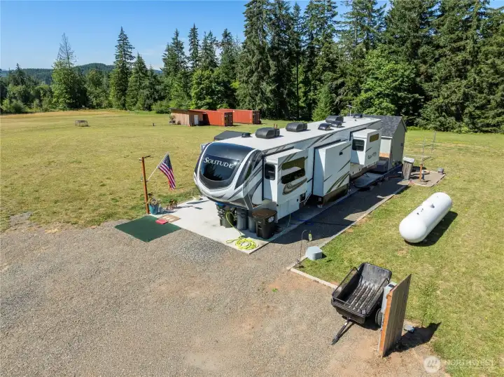 RV pad and hooks ups including, power, water, septic and propane already installed. RV not included