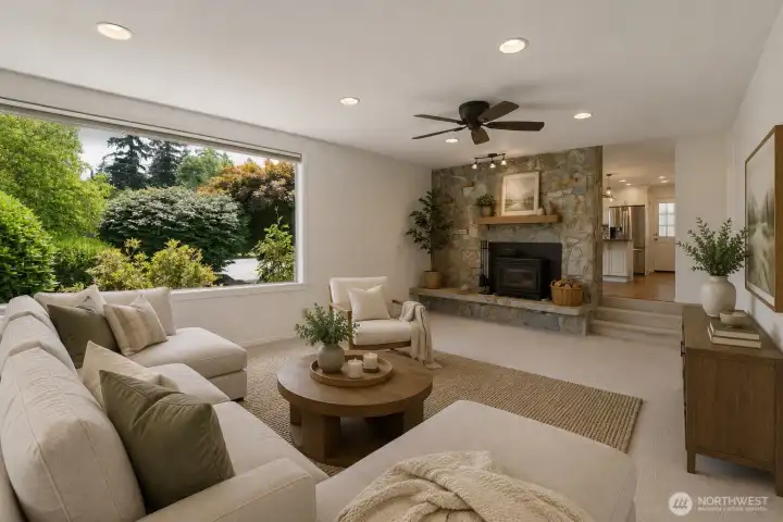 Virtually Staged - Looking from the living room up through the kitchen and beyond into the oversized one car garage with work bench. Virtually Staged - Looking from the living room up through the kitchen and beyond into the oversized one car garage with work bench.