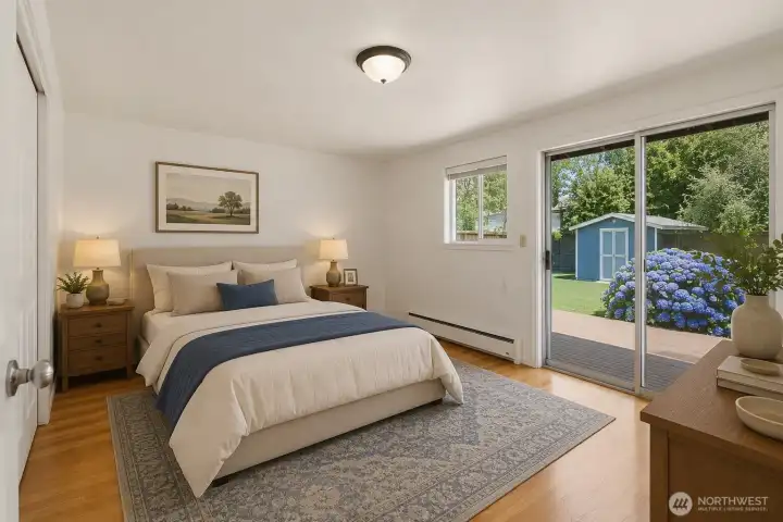 Virtually Staged - Primary bedroom with oversized sliding door to the back yard. Virtually Staged - Primary bedroom with oversized sliding door to the back yard.
