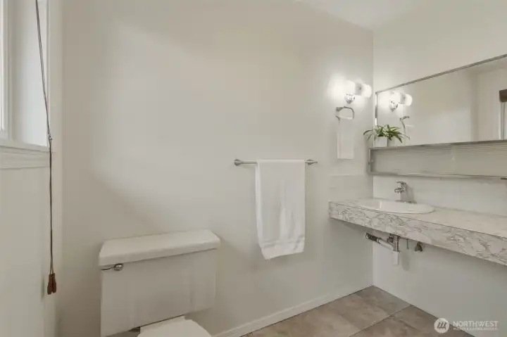 1/2 bath off of the primary bedroom. 1/2 bath off of the primary bedroom.