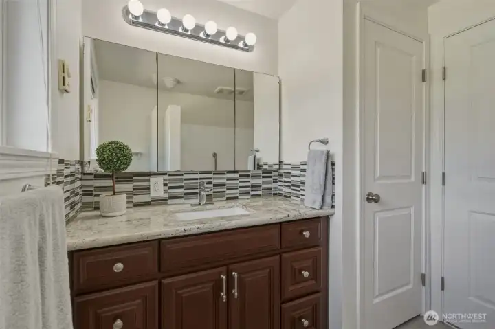 Hall bathroom with linen closet. Hall bathroom with linen closet.