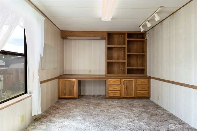 Bedroom#1 perfect for den, office or art space