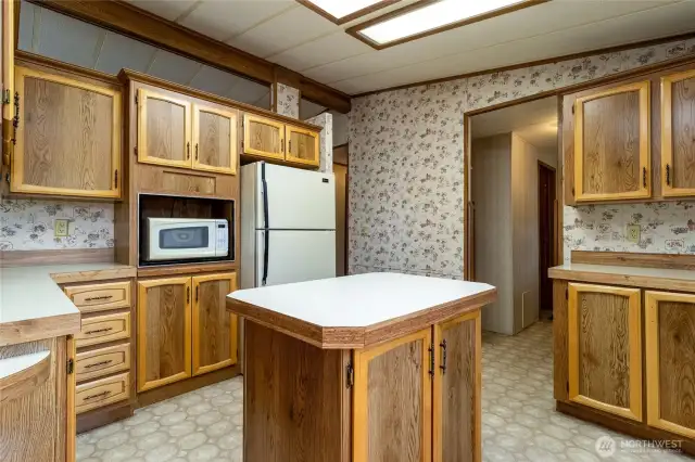 light bright kitchen with laundry room access
