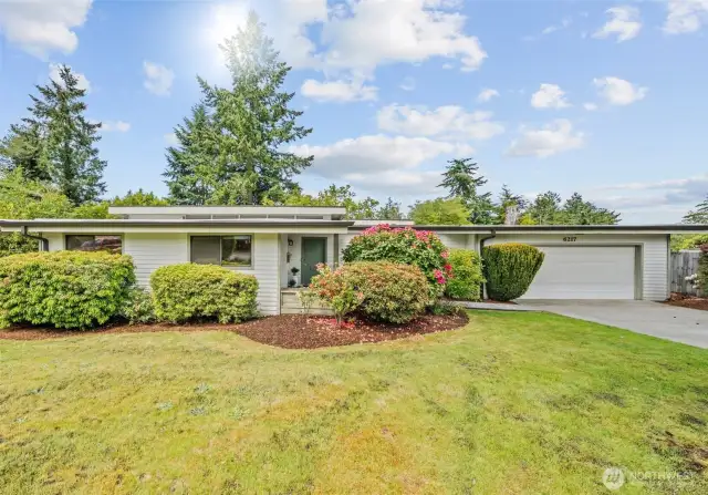 Mid-Century Modern in one of Lakewood's quiet and coveted neighborhoods.