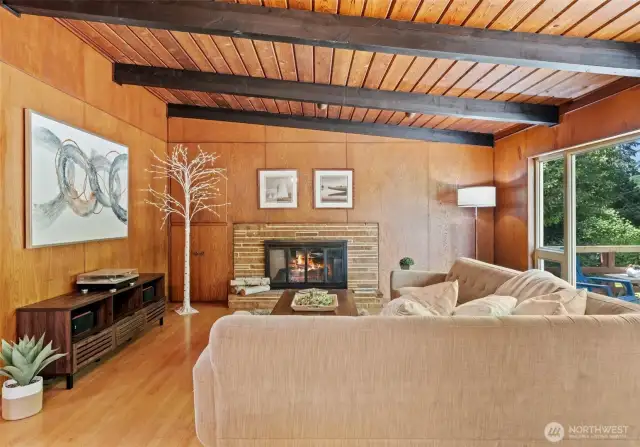 A wall of large windows allows fills the living and dining rooms with sparkling light.