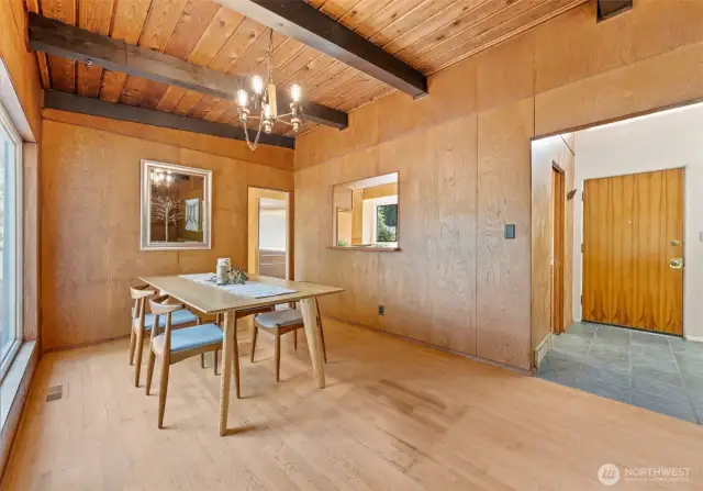 Another view of the dining room with the front entry in the background.