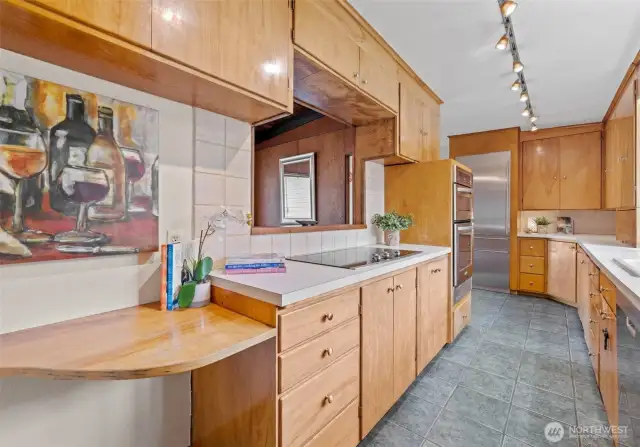 Another view of the kitchen. Built-in oven and microwave/convection oven .