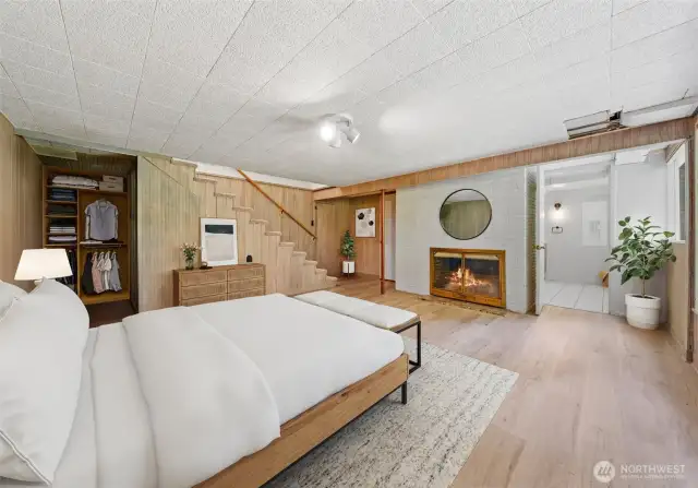 Cozy wood burning fireplace in the primary suite. Natural gas is available to convert the fireplace to a gas log set.