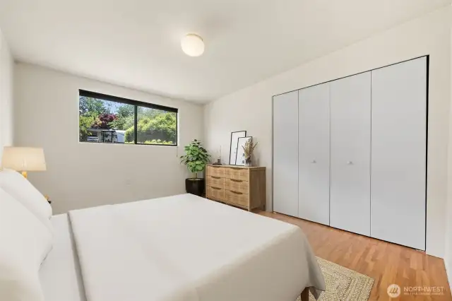 Main floor bedroom #1 with virtual staging.