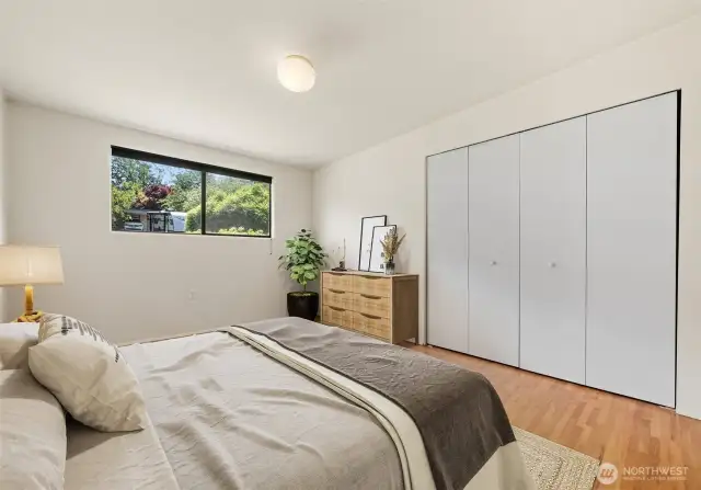 Main floor bedroom #1 with virtual staging.