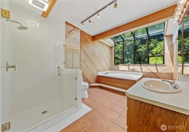Main floor full bath with completely renovated shower. Washer and drying are located in a corner closet.